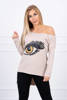 Blouse with a print and longer back beige