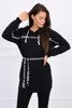 Dress decorated with tape with inscriptions black
