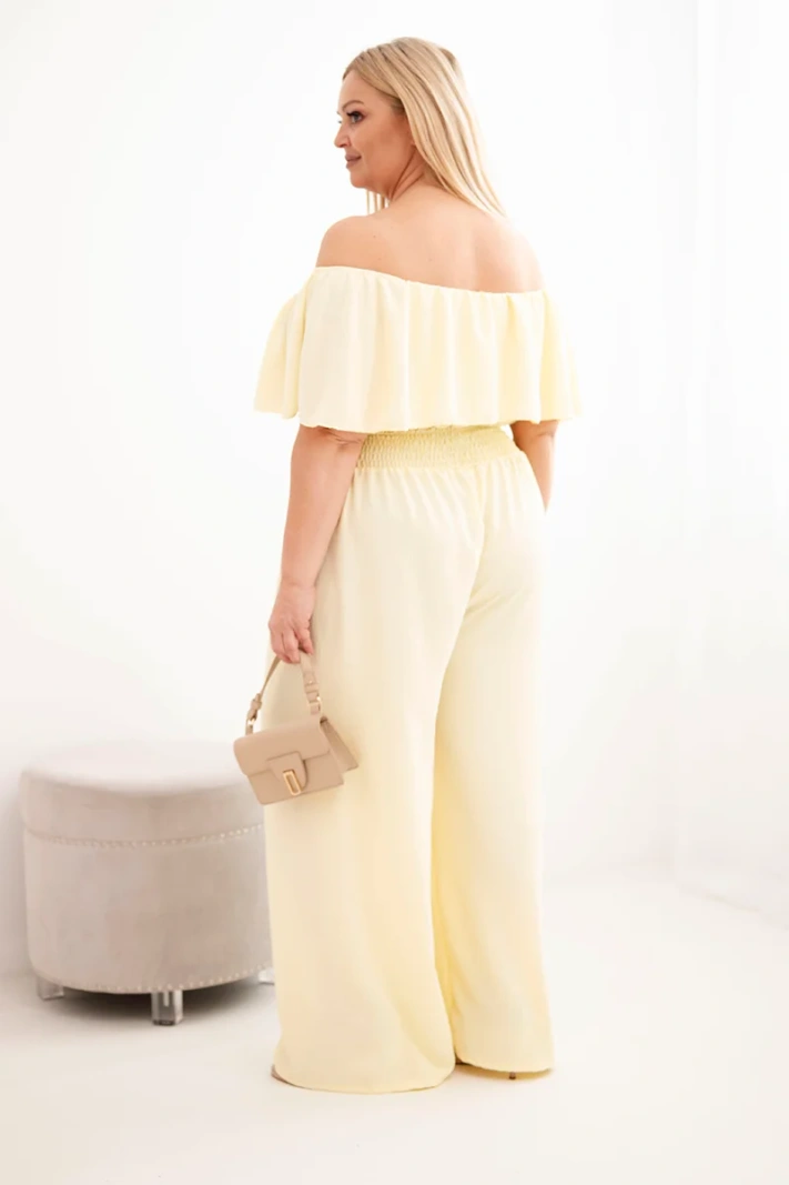 Women's plus-size off-the-shoulder jumpsuit with ruffle and wide-leg yellow