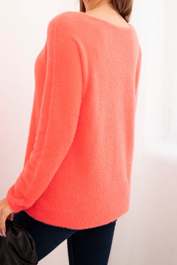 Women's sweater made of soft knit with a round neckline coral