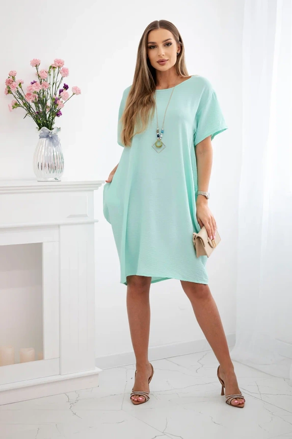 Kleid mit Taschen und Anhänger Helles Mint