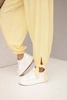 Women’s wide-leg trousers with ties at the bottom yellow