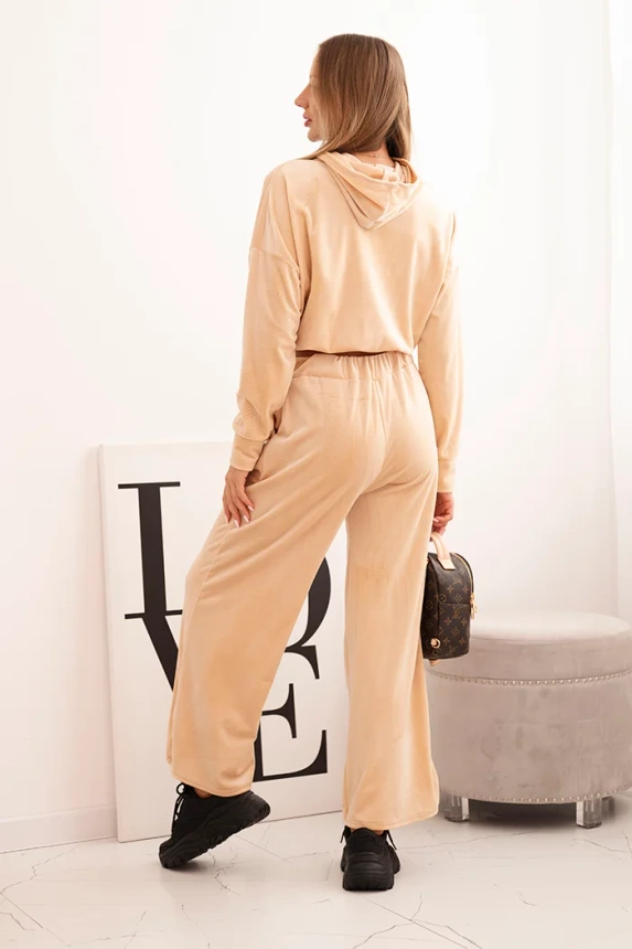 Women's velour tracksuit with wide legs and a hooded sweatshirt beige