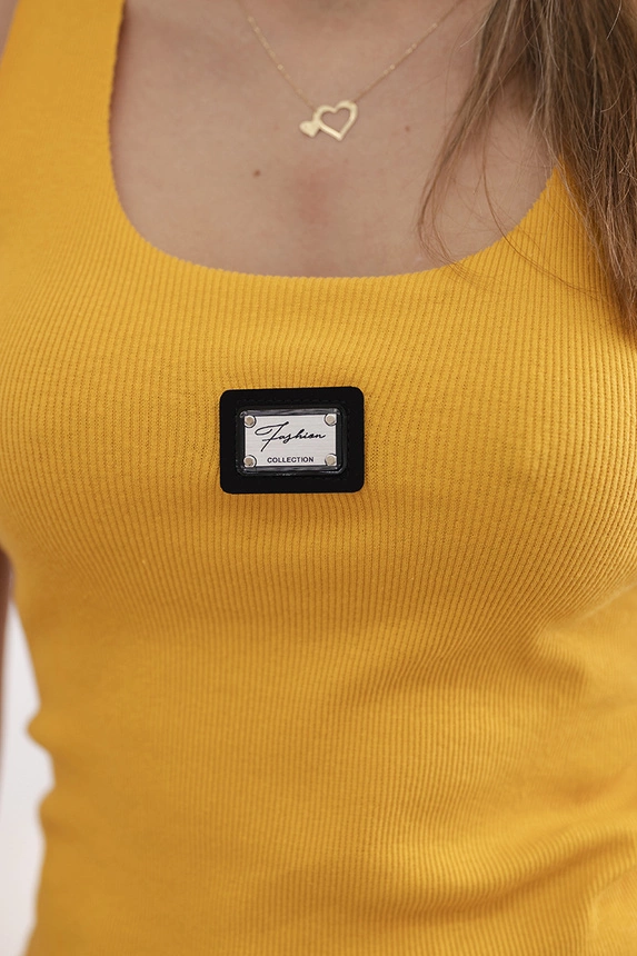 Striped blouse with metal plate mustard