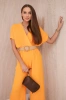 Overalls with a decorative belt at the waist orange