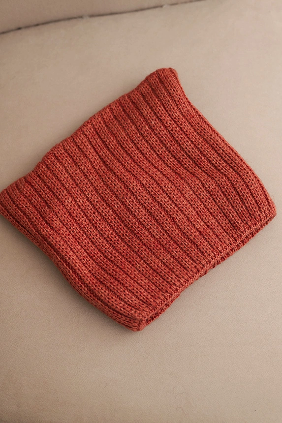 Women's winter hat with wool in a cat style made of ribbed knit K419 rusty