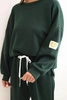 Women's set with a loose sweatshirt and pants with the word LOVE dark green