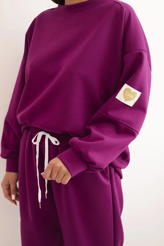 Women's set with a loose sweatshirt and pants with the word LOVE dark purple