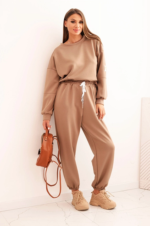 Women's set with a loose sweatshirt and pants with the inscription LOVE camel