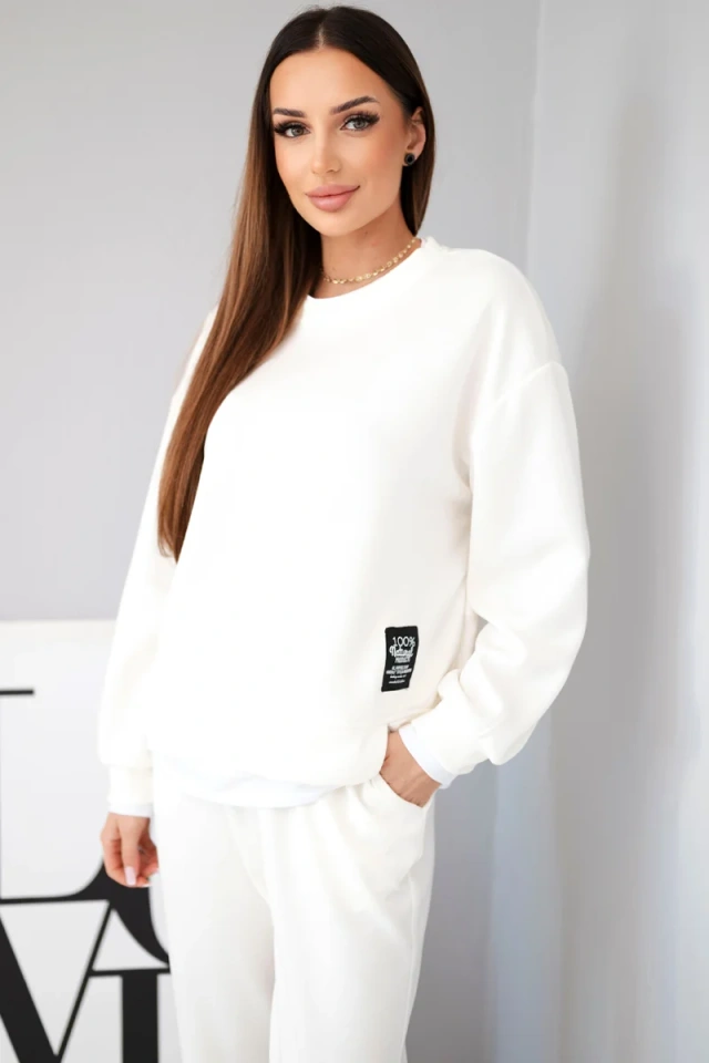 Damenanzug aus butterweichem Material mit lockerer Bluse und Jogginghose ecru