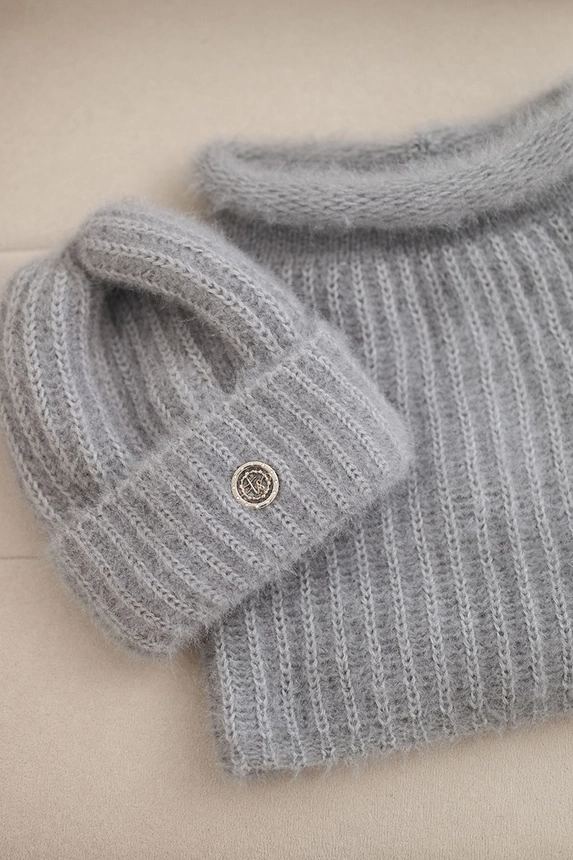 Women's set winter hat and fluffy scarf with decorative emblem dark gray