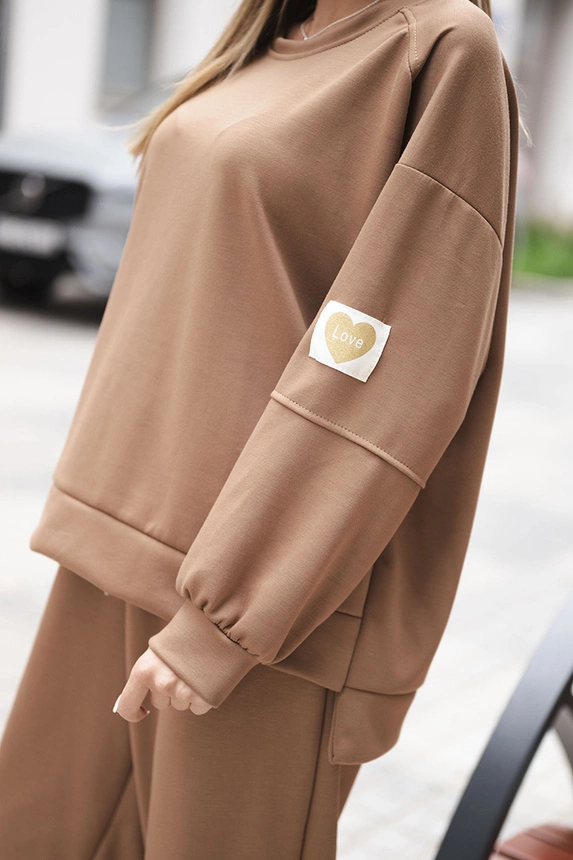 Women's set with a loose sweatshirt and pants with the word LOVE dark camel