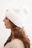 Women's winter fluffy hat with decorative button white