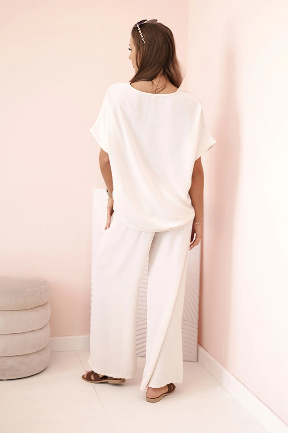 Women's viscose set with decorative flower and wide trousers - beige