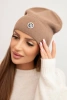 Women's soft hat made of fluffy knit with a decorative plate fango