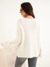 Damenpullover mit Fransen an den Ärmeln und rundem Ausschnitt beige
