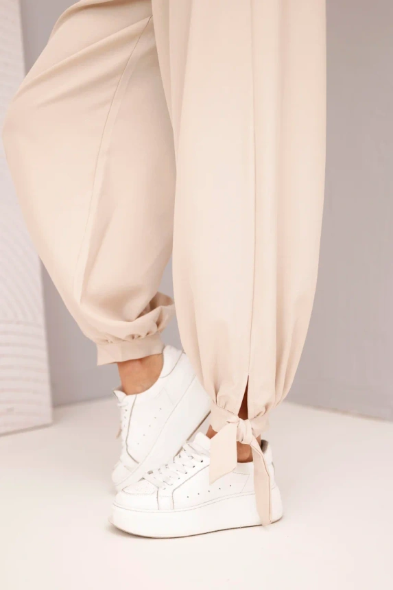 Women's wide-leg pants with ties at the bottom beige