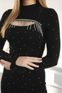 Strickkleid mit dekorativem Ausschnitt schwarz