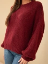 Oversize women's sweater with a round neckline and cuffed burgundy
