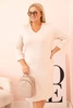 Plus Size women's dress in butter color with a V-neck and beige sleeves
