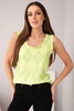 Women's sleeveless viscose blouse with diamonds and frill at the neckline green