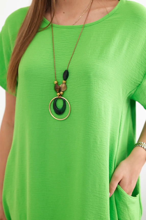 Dress with pockets and a pendant light green
