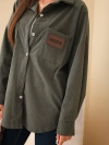 Women's oversized corduroy cotton shirt with pockets and long sleeves khaki