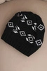 Damenwintermütze aus Wolle mit geometrischem Muster K434 schwarz + weiß