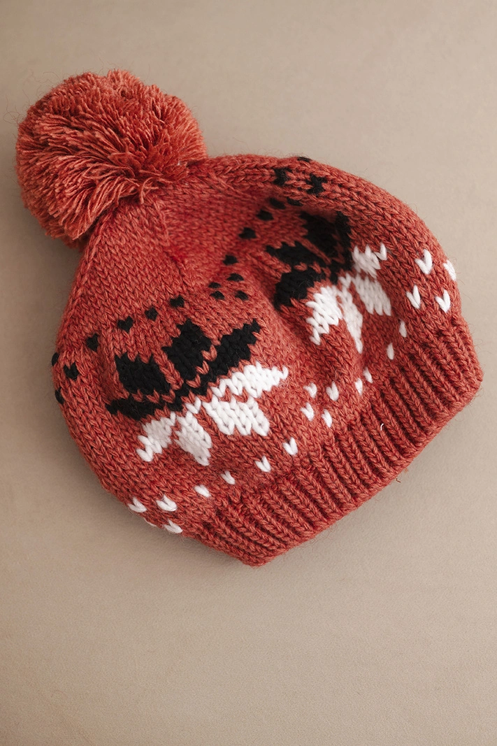 Women's winter wool hat with snowflake pattern and pom-pom K457 ginger