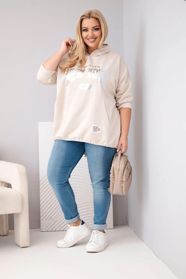 Bluza damska Plus Size masełko z kapturem i kieszenią kangurką beżowa