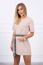 Dress with a decorative belt beige