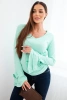 Women's ribbed blouse with a V-neck and ruffles on the sleeves mint