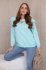 Cotton blouse with frills on the shoulders mint