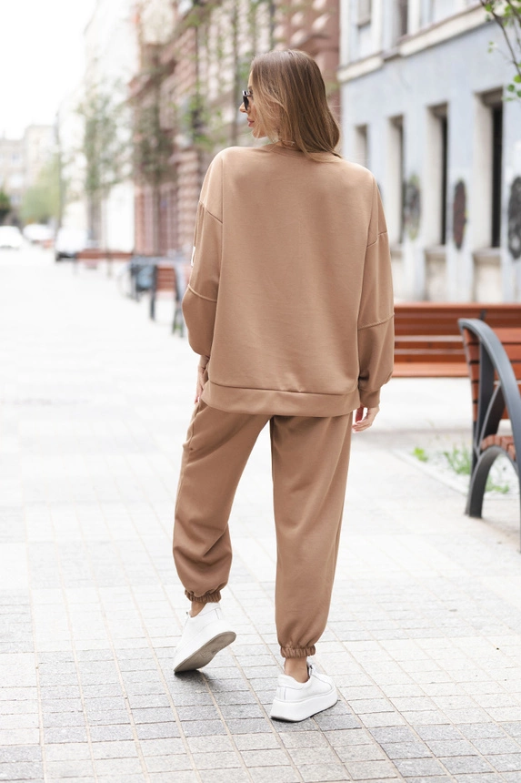 Women's set with a loose sweatshirt and pants with the word LOVE dark camel