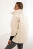 Women's quilted jacket with a short cut and stand-up collar light beige