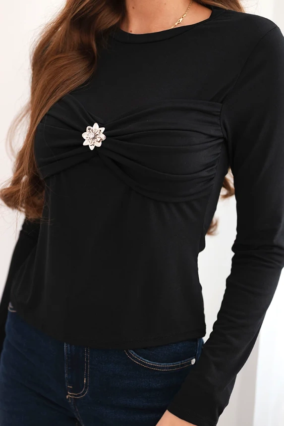 Fitted women's viscose blouse with draping and a brooch black