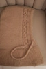 Women's hooded cap with ties and braided pattern camel