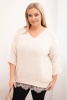 Women's set with a V-neck sweater and a viscose blouse with a lace bottom beige