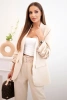 Elegant set of jackets and trousers light beige