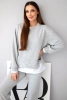Women's set with a loose sweatshirt and sweatpants butter gray mélange