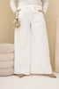 Plus Size women's pants with wide legs and decorative flower at the waist ecru