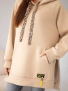 A sweatshirt women's oversize made of cotton with a hood and a pocket beige
