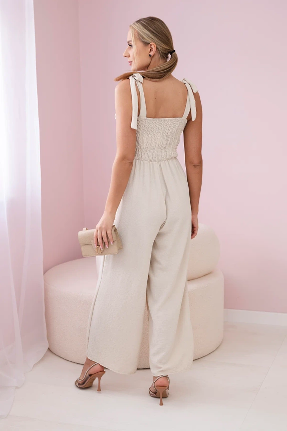 Strappy jumpsuit with ruffled top beige