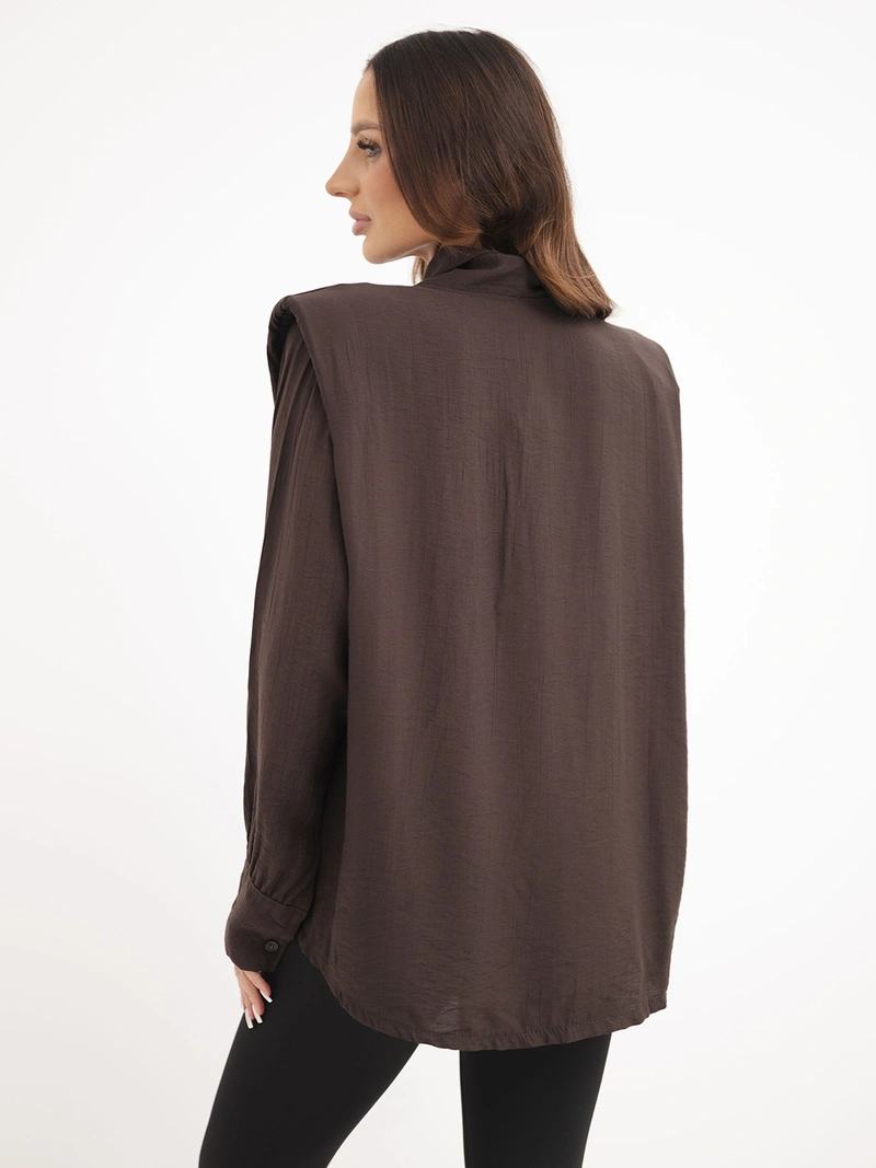 A shirt women's made of viscose with long sleeves and a collar brown