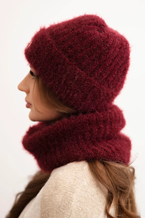 Women's set hat and winter fluffy scarf with decorative emblem burgundy