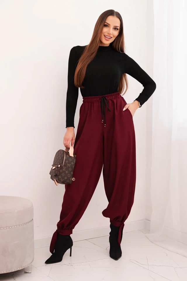Women’s trousers with wide legs and ties at the bottom burgundy