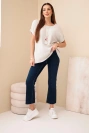 Muslin blouse with a necklace beige
