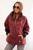Quilted women's jacket with a short cut and a stand-up collar burgundy