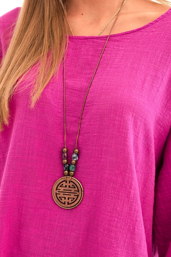 Women's set made of viscose, blouse with a necklace and pants purple