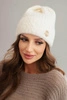 Women's winter hat made of fluffy knit with an elegant button ecru